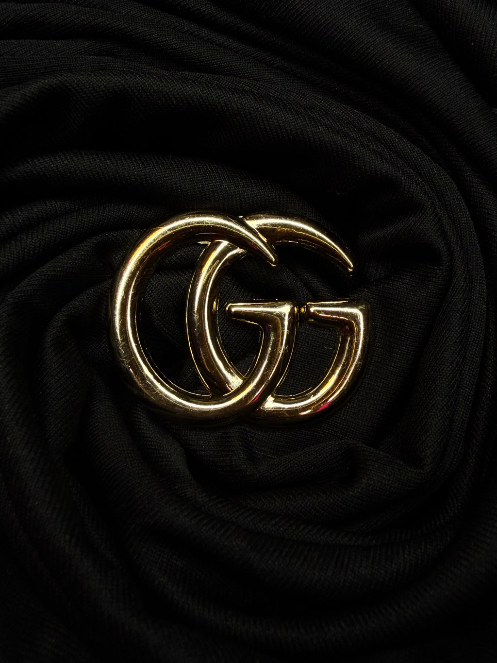 GG brooch