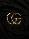 GG brooch