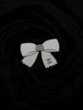 CC Bow Brooch