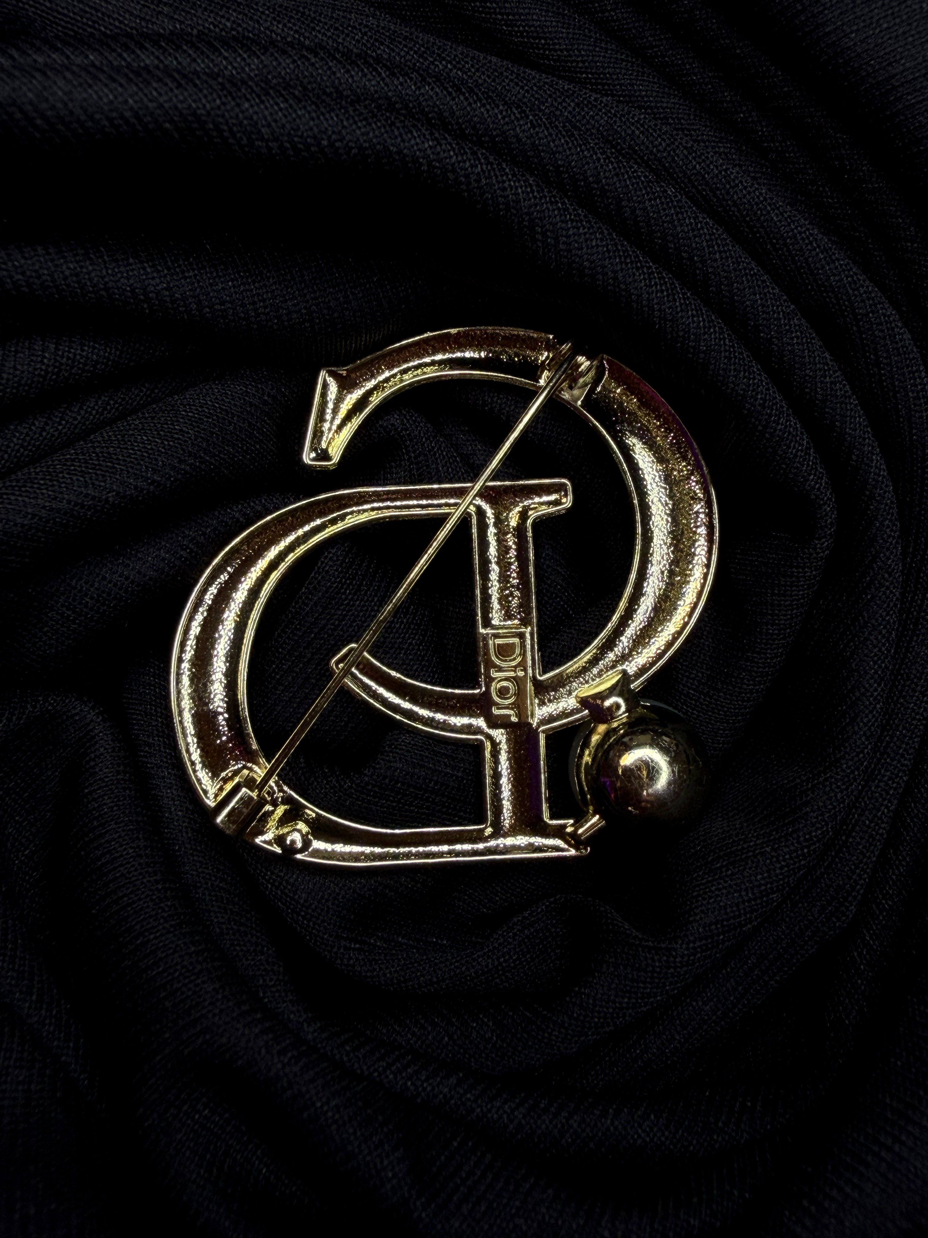 CD Brooch